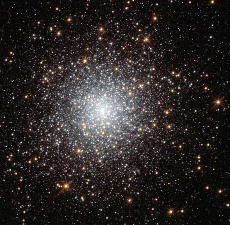 Central concentration of white stars, becoming more diffuse at the edges.
