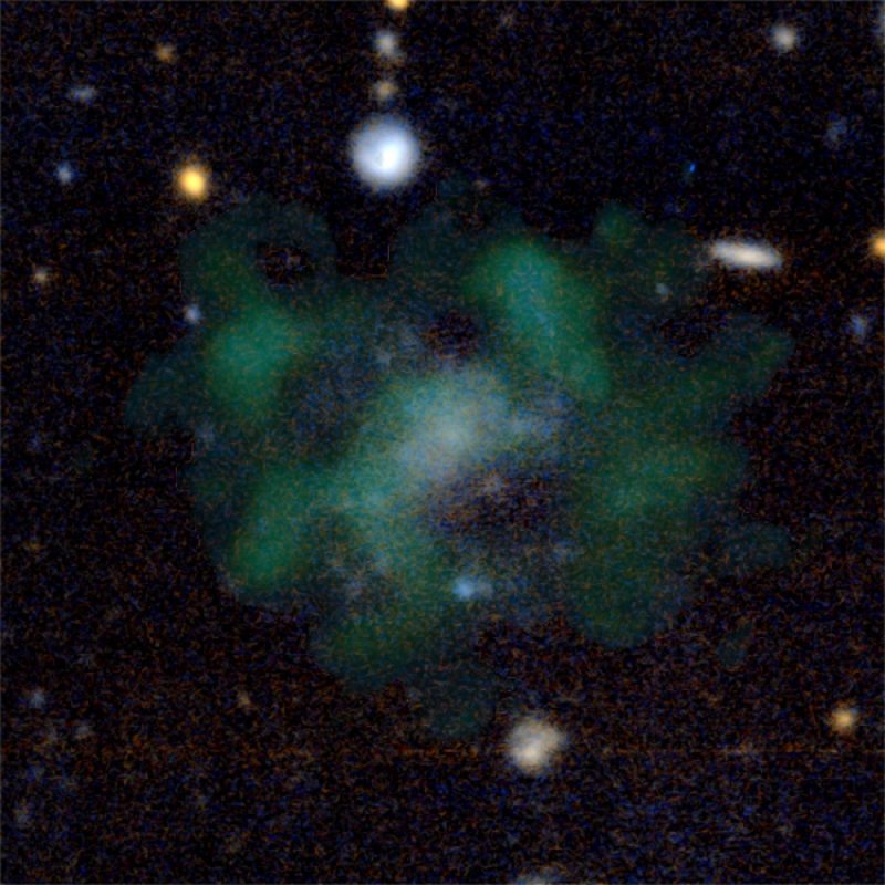 Dark matter missing: Amorphous blob of dark green on black background.