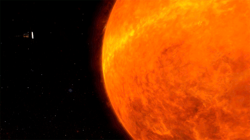 Spacecraft swinging around orange sun.