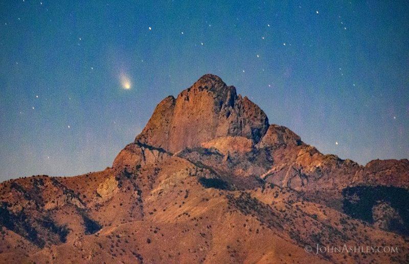 Comet above a mountain.