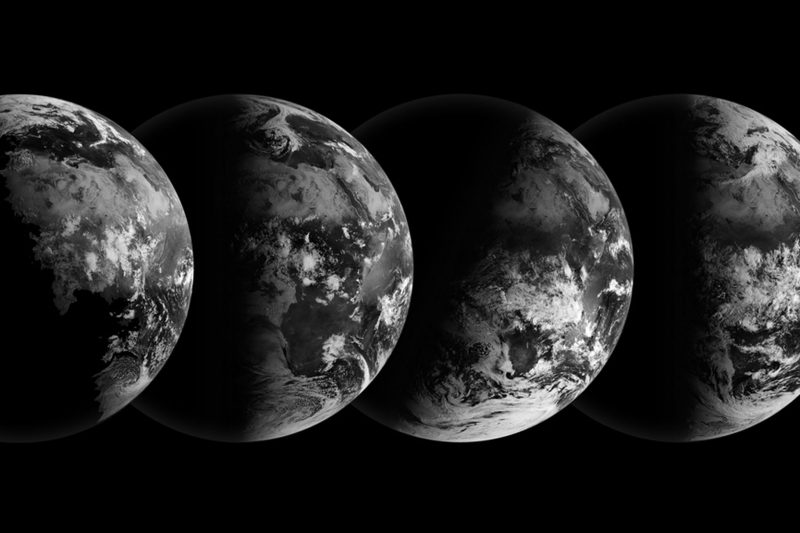 Equinox: Four black and white satellite views of half-Earth, with different seasonal tilts.