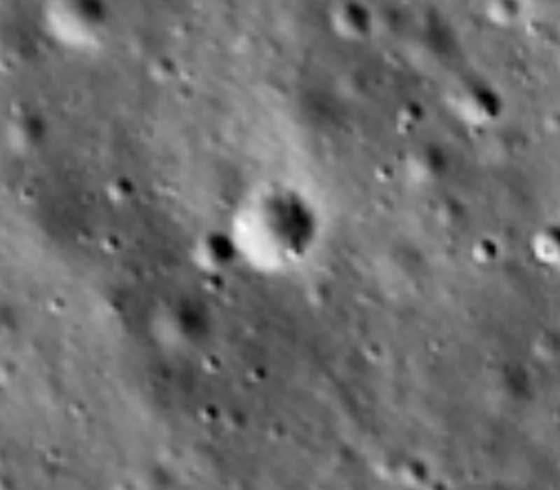 Grey terrain with many craters.