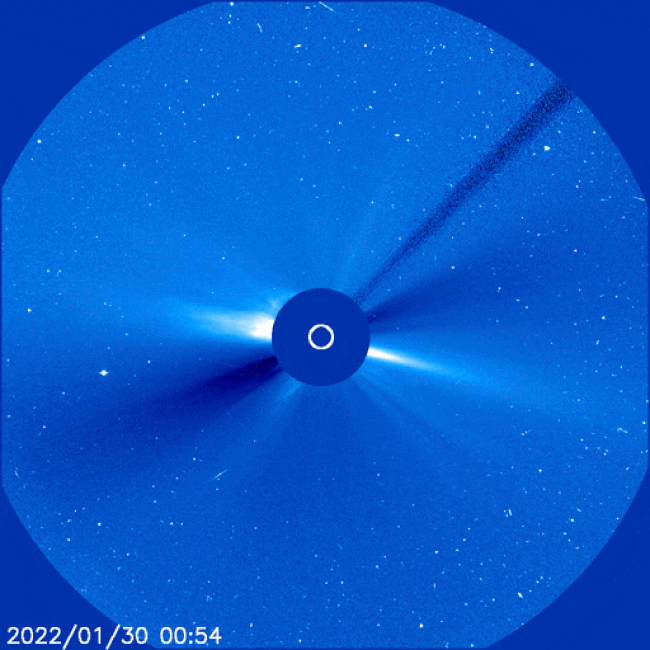 Animated view of sun with solar disk blocked out and wave of light blasting outward.