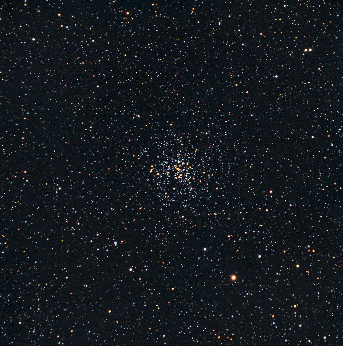 Black background with starfield and concentrated white dots at center.