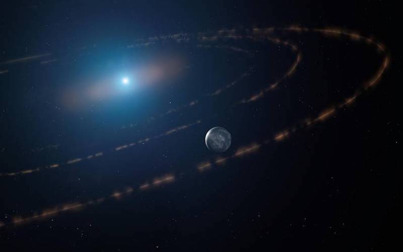 Habitable zone planet orbiting a bright white star, with other rings of debris.