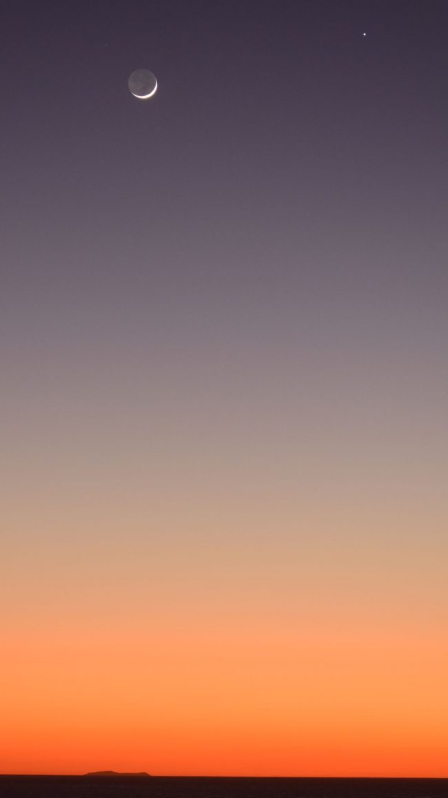 Beautifully layered twilight colors and the moon and Jupiter.