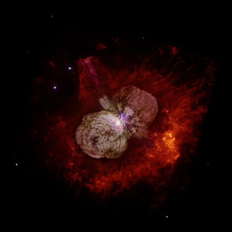 Carina the Keel: White core with red at edges: two cloud-like lobes exploding outward.