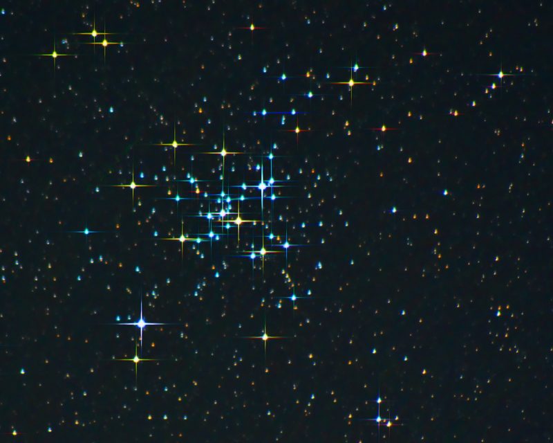 M41: Blue and yellow dots with spikes with black background.