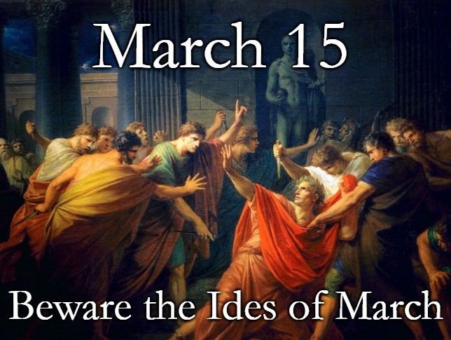 Old painting of Julius Caesar falling, many men surround him, some have knives. Words March 15 at top and Beware the Ides of March at bottom.