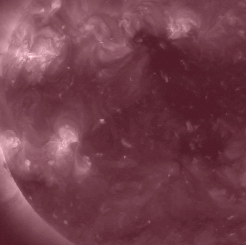 Heaving, roiling purple surface with bright streaks moving across it.