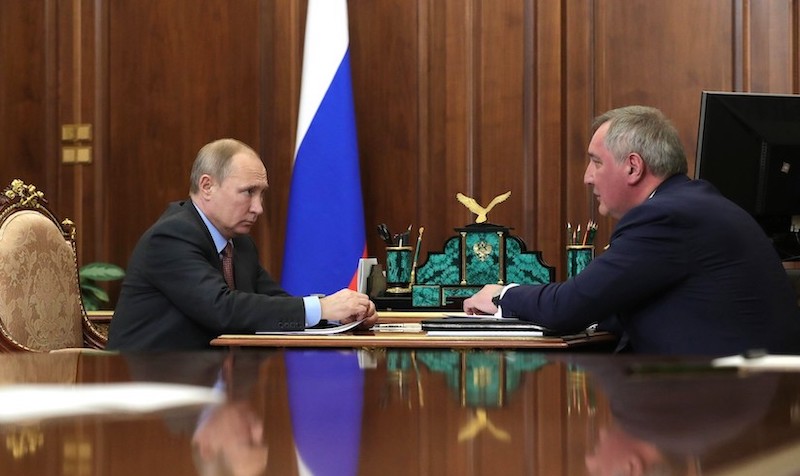 Russia invasion: Two men, including the president of Russia, Vladimir Putin, sit at a table.