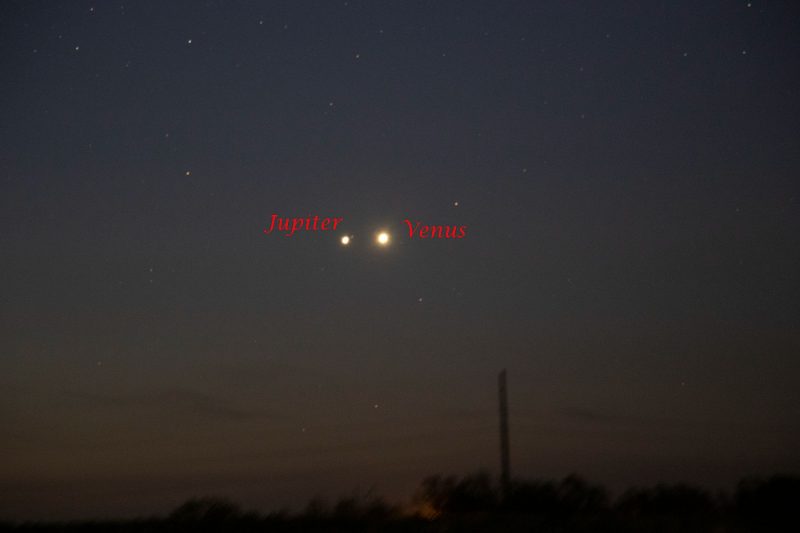 Jupiter and Venus at dawn, seen as two bright points of light in the sky.