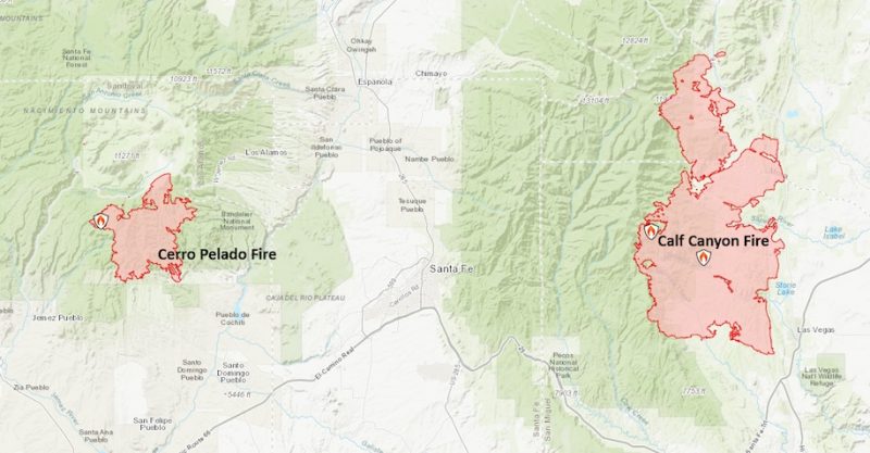 Two maps, with mountainous terrain indicated and large irregular pink areas for fires.