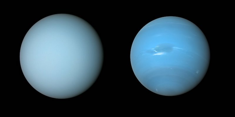 Uranus and Neptune: 2 sky blue planets beside each other, one a bit darker, on black background.