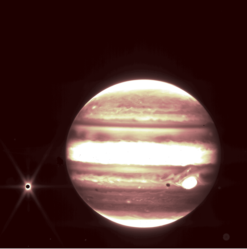 Bright planet with dark horizontal bands and bright spot with black center to the left.
