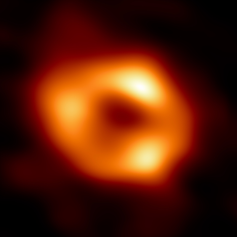 Bright glowing ring structure with 3 brighter spots along the ring.