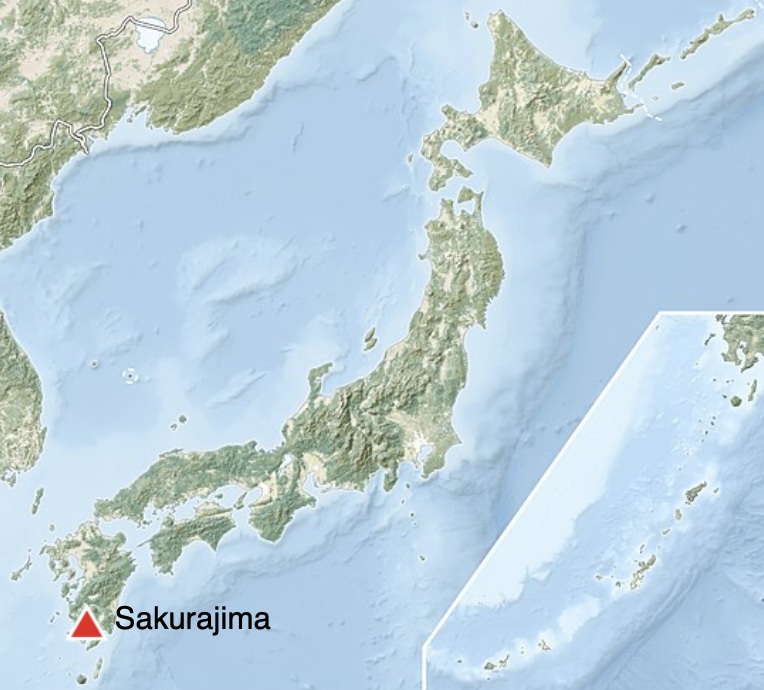 Map of Japan with a labeled red triangle at lower left showing location of volcano.