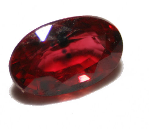 Oval faceted ruby.