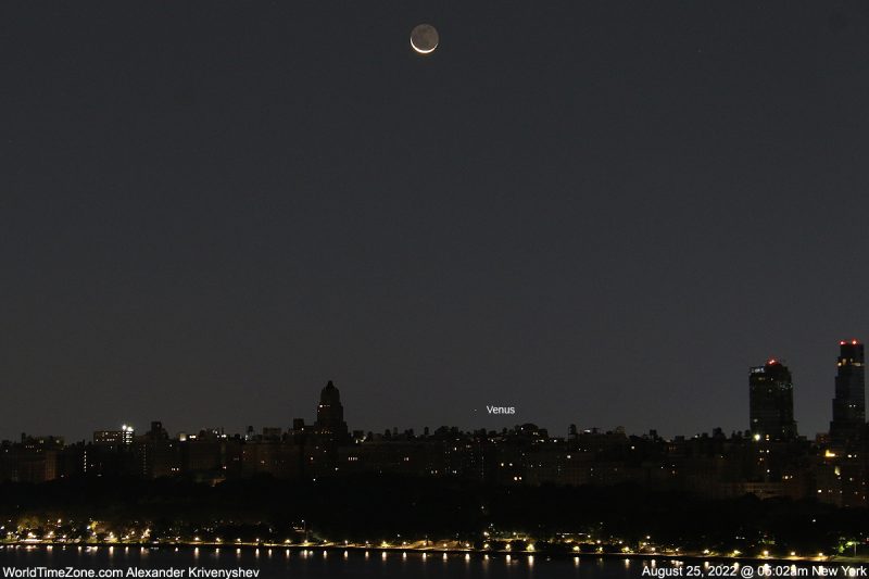 Cityscape in foreground with crescent moon and point of light labeled Venus.
