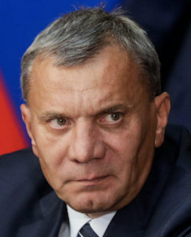 Middle-aged man with an intense look on his face.