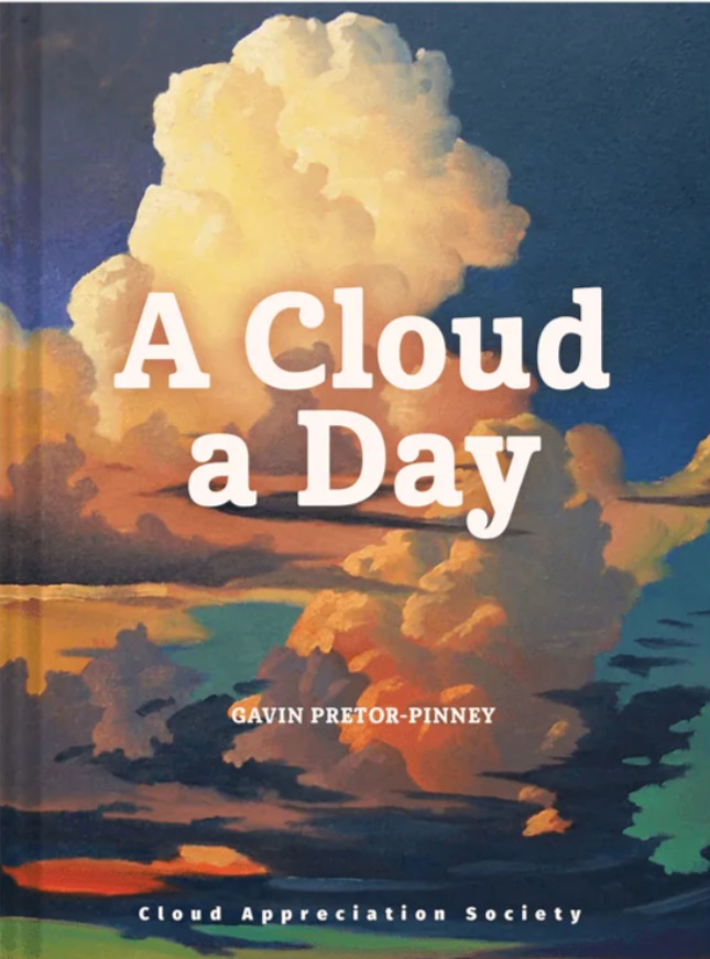 Book cover showing a painting of multi-colored towering clouds.