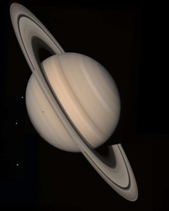 Saturn's lost moon Chrysalis: Saturn titled nearly sideways with a few moons.