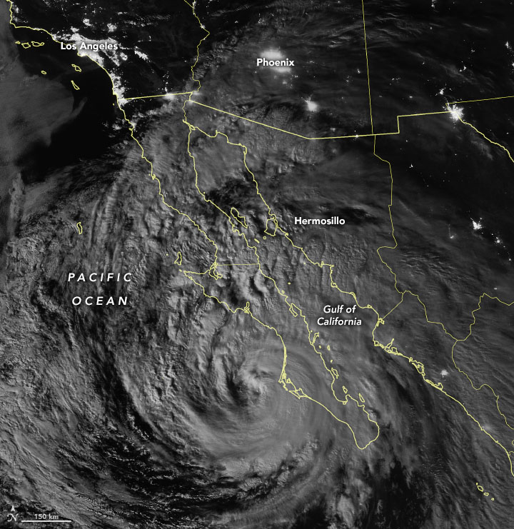 Satellite view of tropical storm Kay with outlines of states imposed over image.