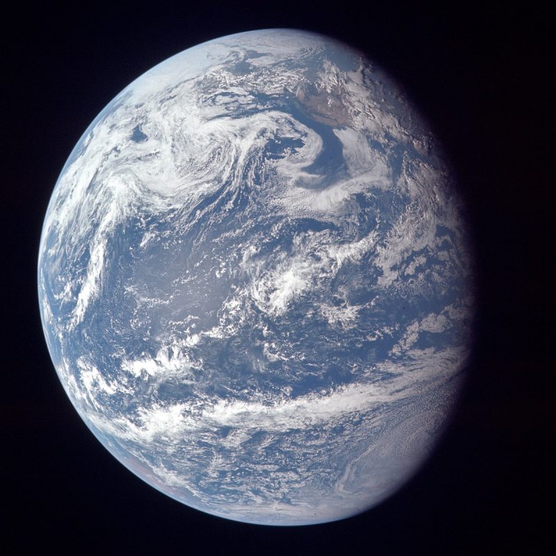 Photograph of a gibbous Earth from space.