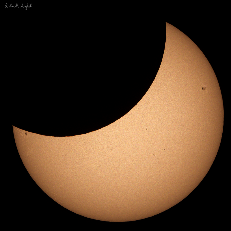 A large crescent-shaped sun.