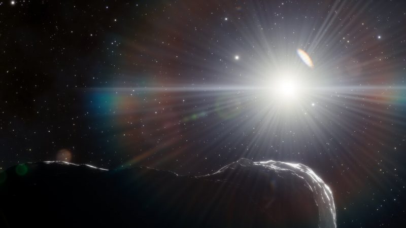 New sun-hugging asteroids: Space rock barely visible with brilliant sun glaring in the distance.