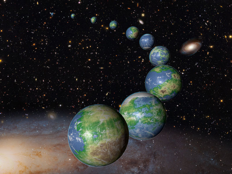 Multiple Earth-like planets in a long curving line with stars and galaxies in background.