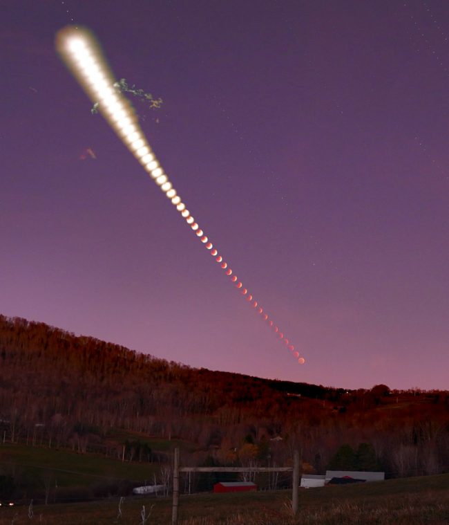 Time-lapse of setting moon in eclipse. The sky looks pink.