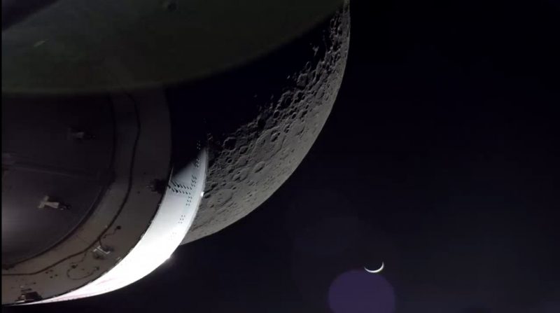 Capsule in foreground, then cratered moon, with sliver of Earth behind.