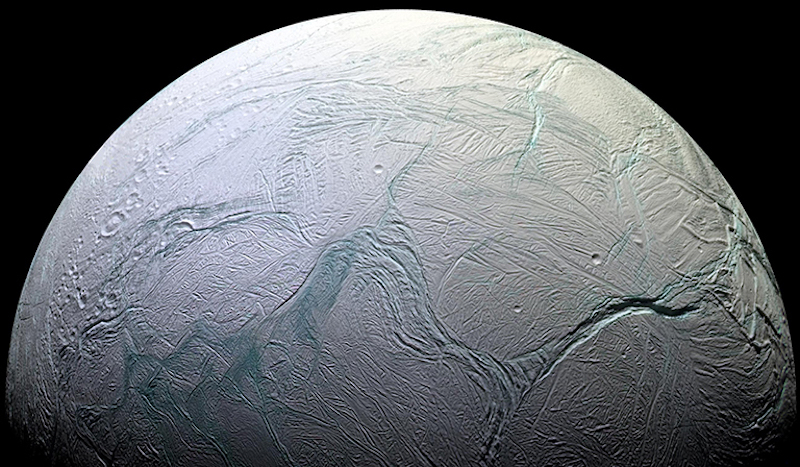 Enceladus' ocean: Smooth planet-like object with many long grooves on its surface, on black background.