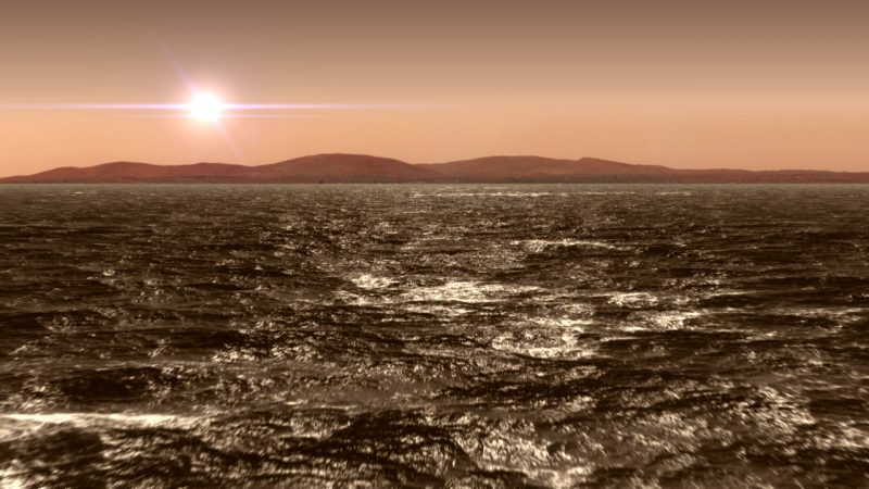Mars: Glittering ocean with sun and reddish sky above it, dark red hills in background.