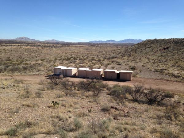 Trailors on desert site.