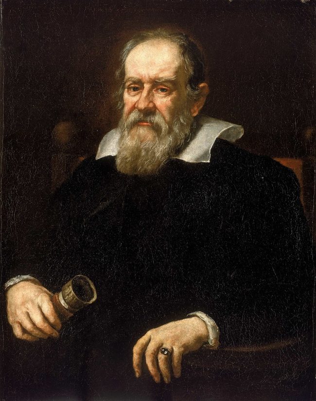 Serious older man with beard in wide white collar. He holds a small telescope.