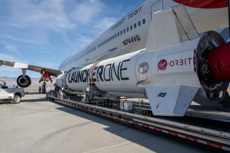 Virgin Orbit's premiere UK launch: White jet airplane and white rocket next to each other.