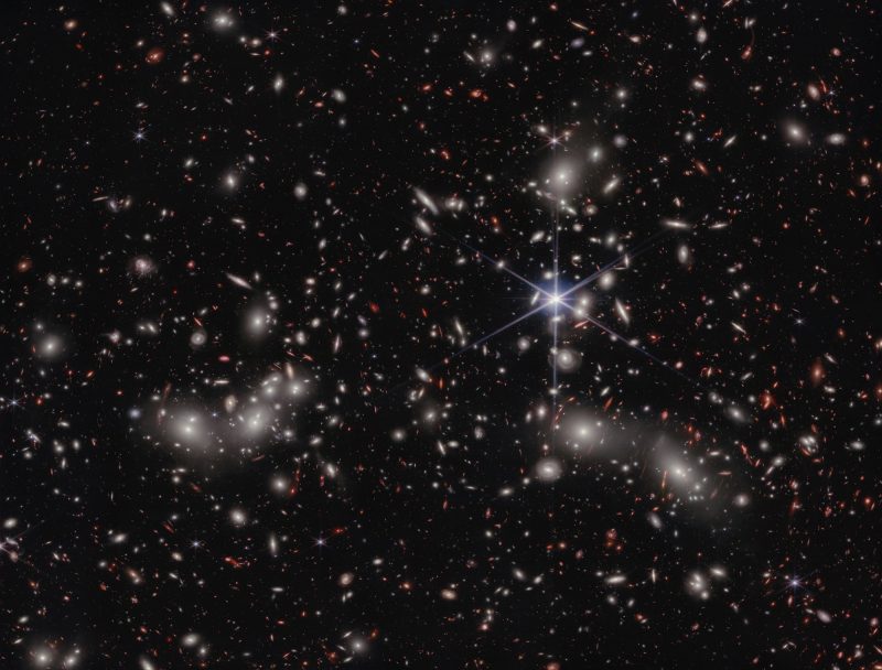 Pandora's Cluster: Deep-sky image with myriads of galaxies ranging from dot size to 2 larger foreground groups.