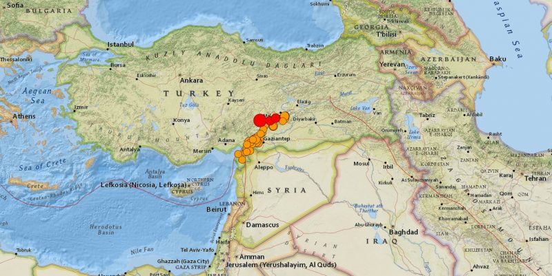 Turkey-Syria earthquake: Map showing Turkey and Syria. Many orange and red dots on the border of Turkey and Syria.