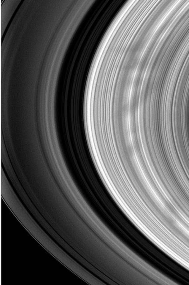 Saturn's rings in black, white and gray.