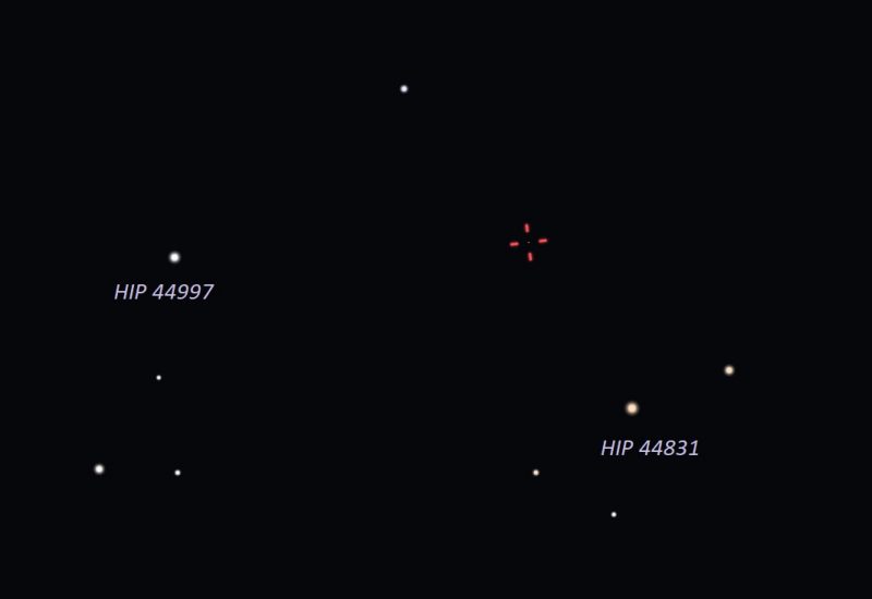 A few stars, 2 labeled, and red tick marks showing asteroid location.