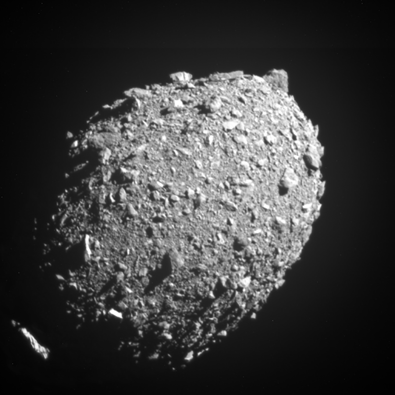 DART asteroid impact: Oval-shaped rocky body covered in boulders.