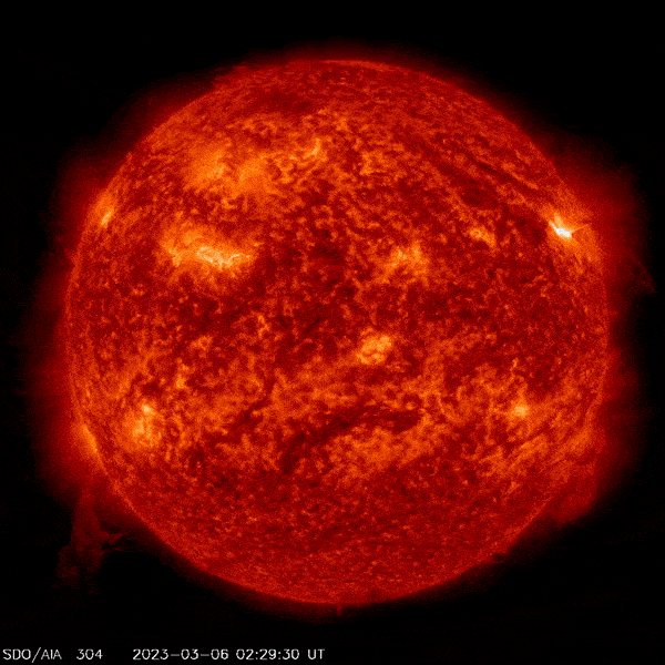 March 7, 2023, sun activity: Red sphere with brighter areas and little lightnings on them.