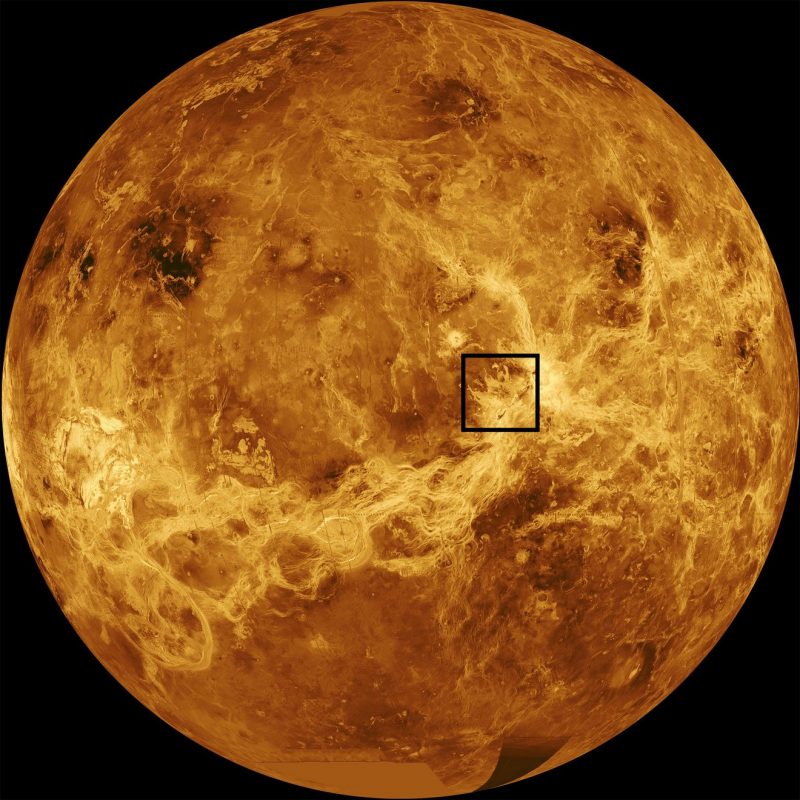 Orange sphere showing Venus and black box over volcanic area.