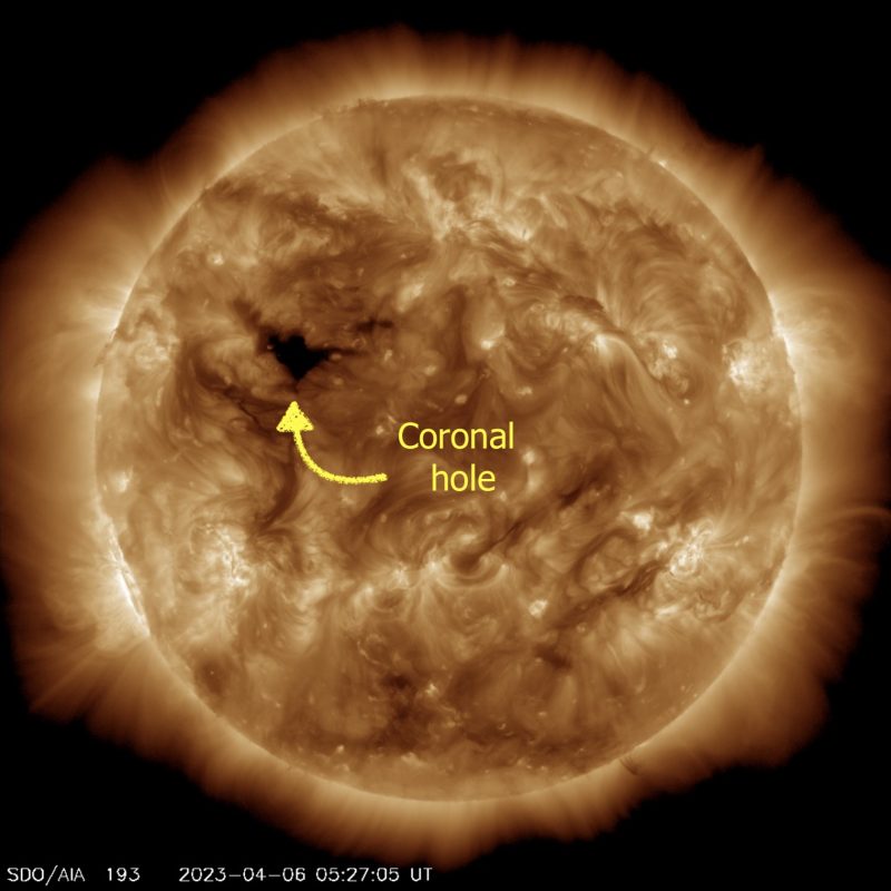 April 6, 2023, sun activity: Bronze colored sun shows a darker area at top left.