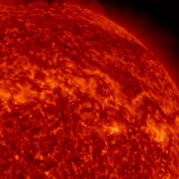 The sun's northwest quadrant rotating with a bright exploding filament