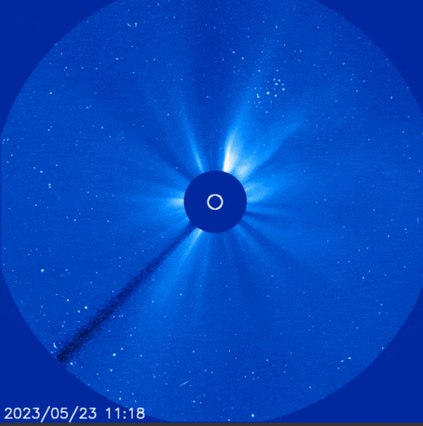 May 23, 2023 A blue image with a dark disc at center covering the sun, with a bright white circle pulsing outwards.