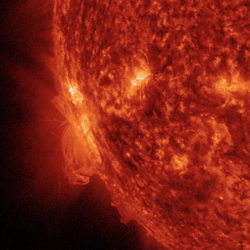 A red quarter of a circle shows a very active region on the sun.