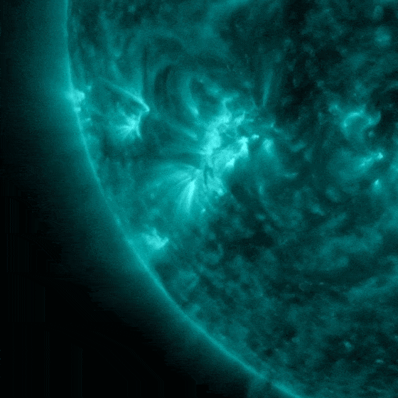 A moving quarter of a sphere in teal color showing an explosion from the sun.